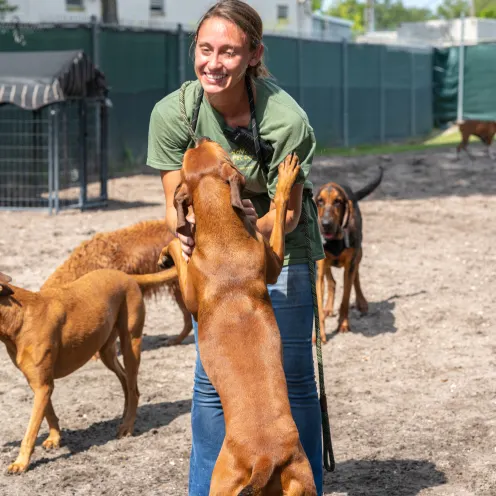 Advantage Pet Center Staff with dogs